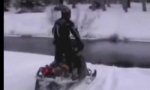 Movie : Snowmobile crossing a river