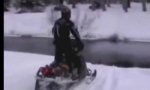 Funny Video : Snowmobile crossing a river